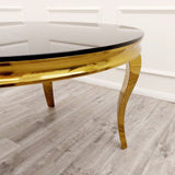 Luxurious-4-seater-black-glass-dining-table-round-tempered-glass-top-gold-legs-130cm