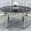 Classic-4-seater-black-glass-dining-table-round-tempered-glass-top-stainless-steel-curved-legs-130cm