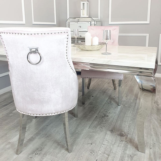 Classic-pink-velvet-knocker-back-dining-chairs-chrome-legs