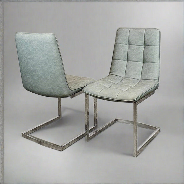 Industrial-light-grey-leather-dining-chairs-chrome-leg