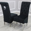 Luxury-black-velvet-dining-chairs-chrome-legs-lion-knocker-quilted-back