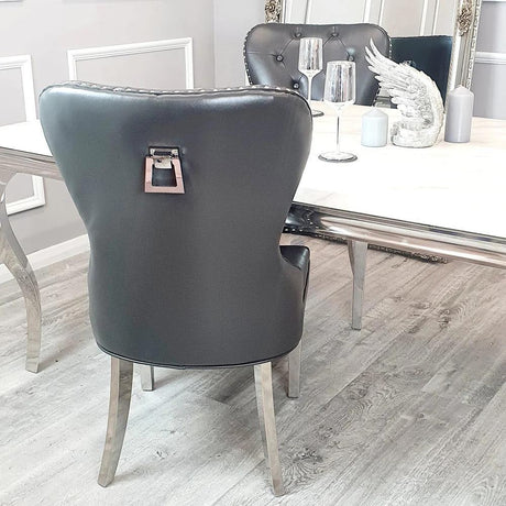 Luxury-dark-grey-leather-dining-chairs-chrome-legs-knocker-back