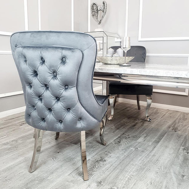 Luxury-dark-grey-velvet-dining-chairs-chrome-legs-button-back