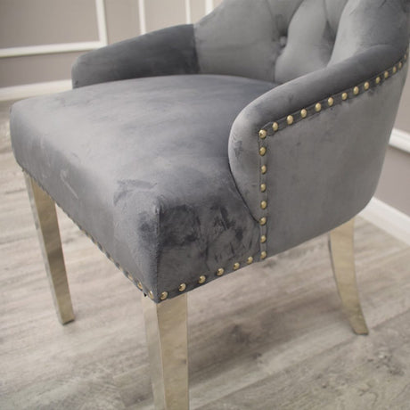 Luxury-dark-grey-velvet-dining-chairs-chrome-legs-lion-knocker