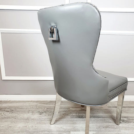 Luxury-light-grey-leather-dining-chairs-chrome-legs-knocker-back