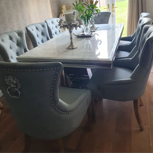 Luxury-light-grey-leather-dining-chairs-chrome-legs-lion-knocker