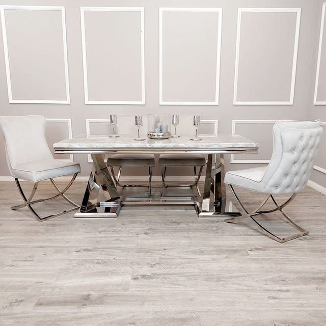 Luxury-light-grey-velvet-dining-chairs-chrome-cross-legs