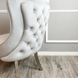 Luxury-light-grey-velvet-dining-chairs-chrome-legs-button-back