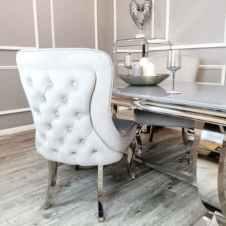 Luxury-light-grey-velvet-dining-chairs-chrome-legs-button-back