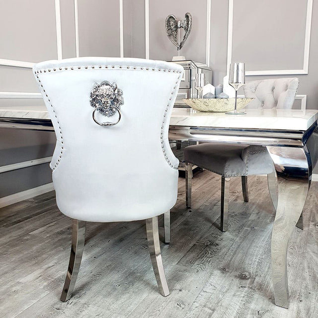 Luxury-light-grey-velvet-dining-chairs-chrome-legs-lion-knocker