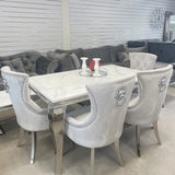 Luxury-light-grey-velvet-dining-chairs-chrome-legs-lion-knocker