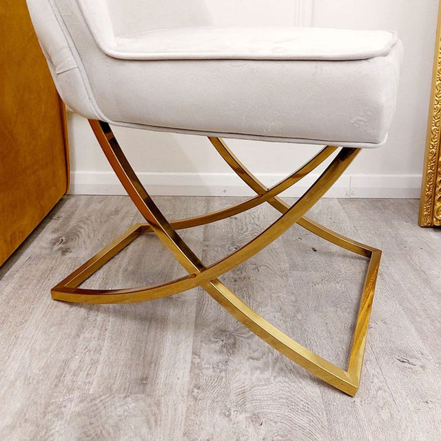 Luxury-light-grey-velvet-dining-chairs-gold-cross-legs