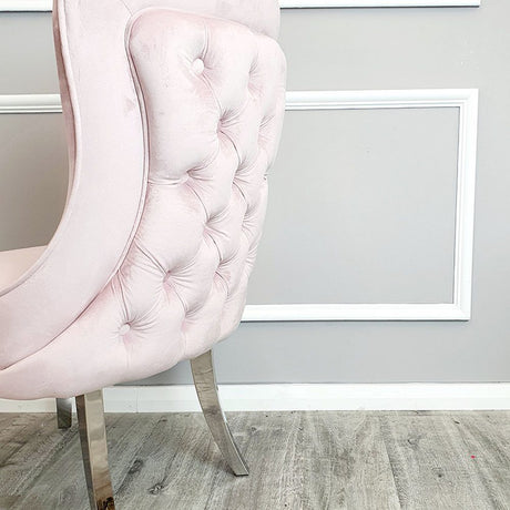 Luxury-pink-velvet-dining-chairs-chrome-legs-button-back