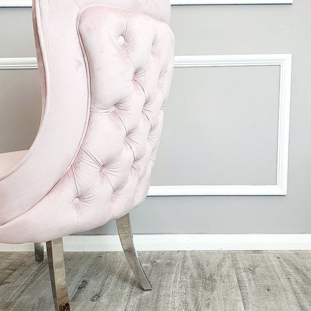 Luxury-pink-velvet-dining-chairs-chrome-legs-button-back