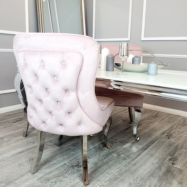 Luxury-pink-velvet-dining-chairs-chrome-legs-button-back