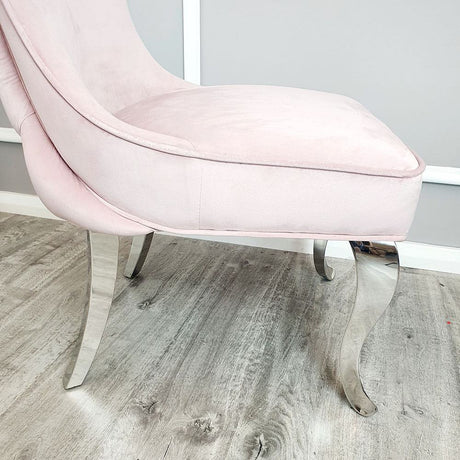 Luxury-pink-velvet-dining-chairs-chrome-legs-button-back