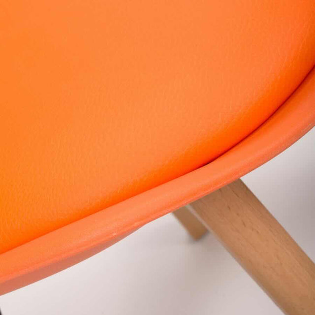 Minimalist-Orange-Plastic-Cushioned-Dining-Chair-Wooden-Beech-Legs