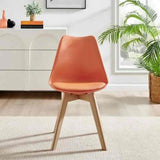 Minimalist-Orange-Plastic-Cushioned-Dining-Chair-Wooden-Beech-Legs