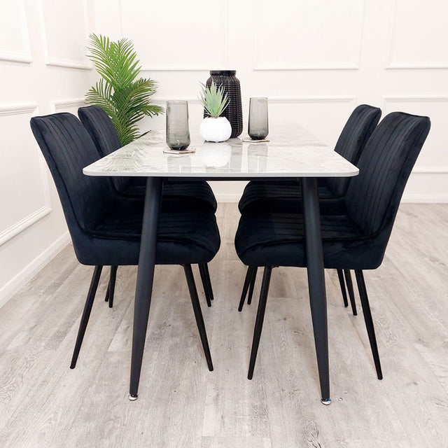 Minimalist-black-velvet-dining-chairs-metal-legs