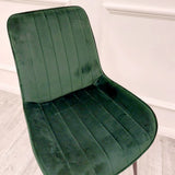 Minimalist-green-velvet-dining-chairs-metal-legs