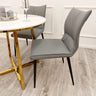 Minimalist-grey-leather-dining-chairs-metal-legs