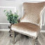 Modern-beige-velvet-lion-knocker-dining-chairs-chrome-legs-quilted-back