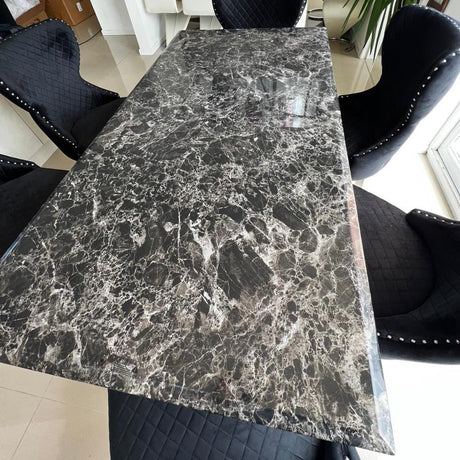 Modern-black-marble-dining-table-rectangular-marble-top-stainless-steel-base