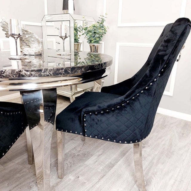 Modern-black-velvet-dining-chairs-chrome-legs-lion-knocker-quilted-back