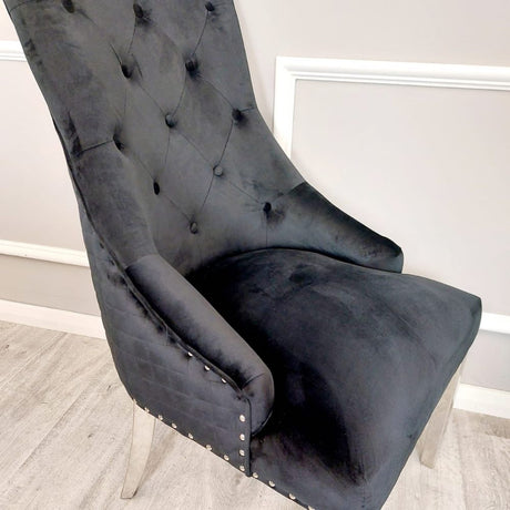 Modern-black-velvet-dining-chairs-chrome-legs-lion-knocker-quilted-back