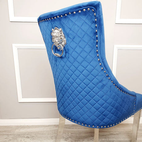 Modern-blue-velvet-dining-chairs-chrome-legs-lion-knocker-quilted-back