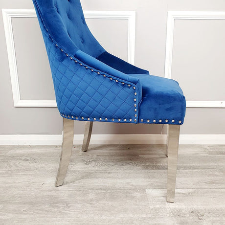 Modern-blue-velvet-dining-chairs-chrome-legs-lion-knocker-quilted-back