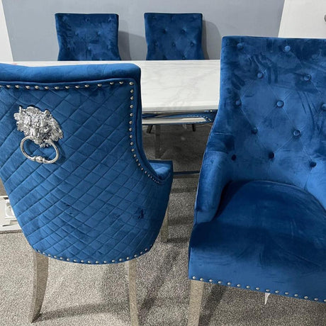 Modern-blue-velvet-dining-chairs-chrome-legs-lion-knocker-quilted-back