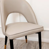 Modern-cream-leather-chairs-metal-legs-with-open-back