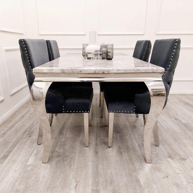 Modern-dark-grey-velvet-dining-chairs-chrome-legs-button-back