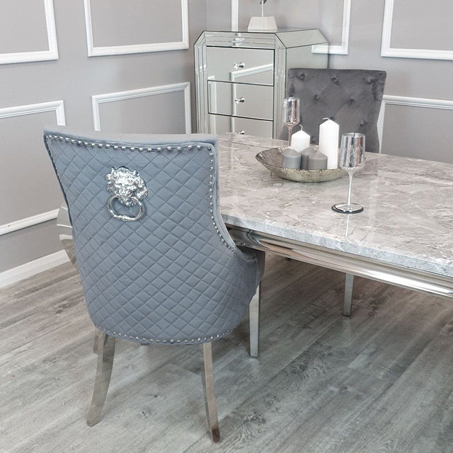 Modern-dark-grey-velvet-dining-chairs-chrome-legs-lion-knocker-quilted-back