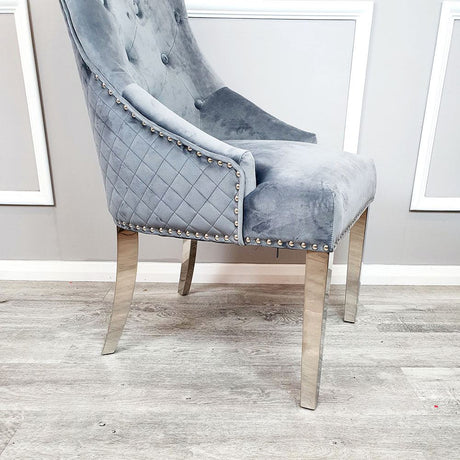 Modern-dark-grey-velvet-dining-chairs-chrome-legs-lion-knocker-quilted-back