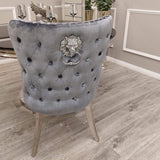 Modern-grey-velvet-lion-knocker-dining-chairs-chrome-legs-quilted-back