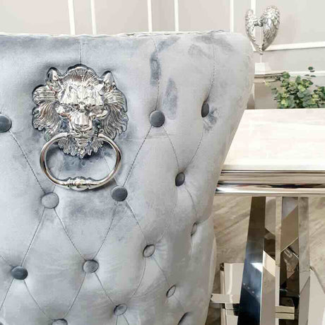 Modern-grey-velvet-lion-knocker-dining-chairs-chrome-legs-quilted-back