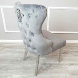 Modern-grey-velvet-lion-knocker-dining-chairs-chrome-legs-quilted-back