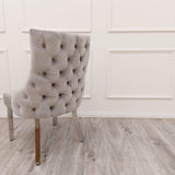 Modern-light-grey-velvet-dining-chairs-chrome-legs-button-back