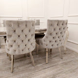 Modern-light-grey-velvet-dining-chairs-chrome-legs-button-back