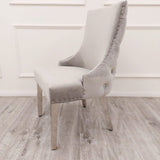 Modern-light-grey-velvet-dining-chairs-chrome-legs-button-back