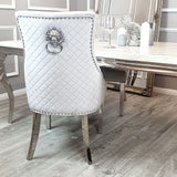 Modern-light-grey-velvet-dining-chairs-chrome-legs-lion-knocker-quilted-back