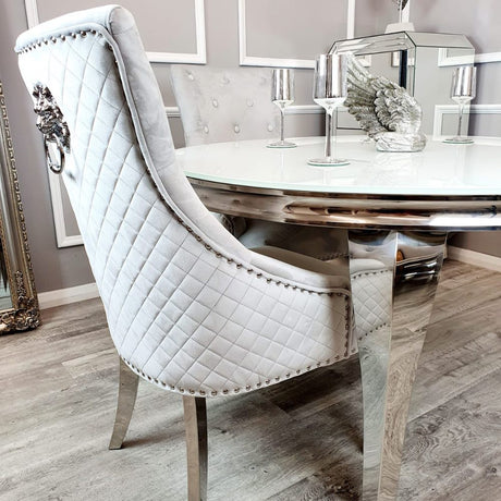 Modern-light-grey-velvet-dining-chairs-chrome-legs-lion-knocker-quilted-back