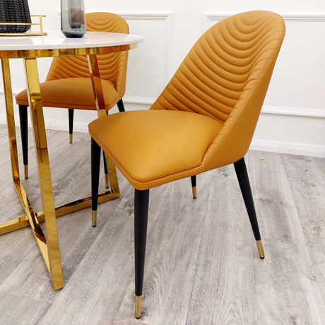 Modern-orange-leather-dining-chairs-metal-legs