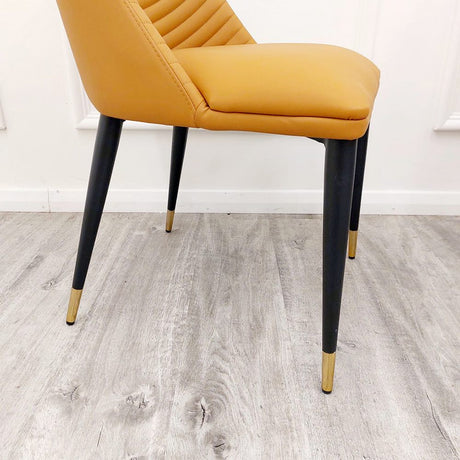 Modern-orange-leather-dining-chairs-metal-legs