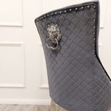 Modern-shimmer-grey-velvet-dining-chairs-chrome-legs-lion-knocker-quilted-back