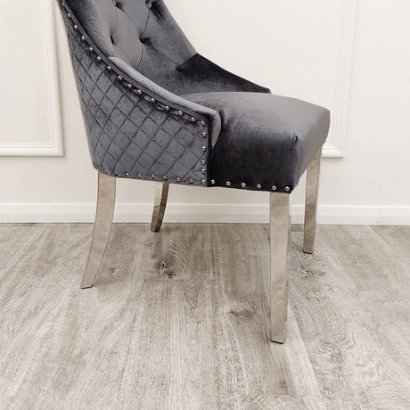 Modern-shimmer-grey-velvet-dining-chairs-chrome-legs-lion-knocker-quilted-back