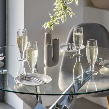 industrial-round-tempered-glass-dining-table-with-chrome-metal-legs-120cm