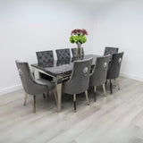 modern-4-8-Seater-black-marble-dining-table-rectangular-marble-top-stainless-steel-curved-legs